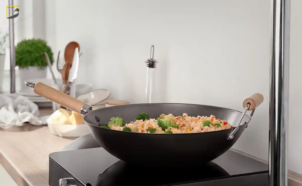 تابه وک چیست؟ انواع کاربردهای تابه وک در آشپزی